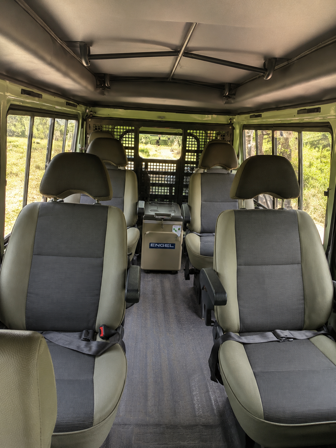inside a 4x4 custom safari jeep equipped by charging socket, fridge, wifi and radio
